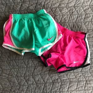 Pair of Nike girls athletic shorts 4t. Pink & Teal